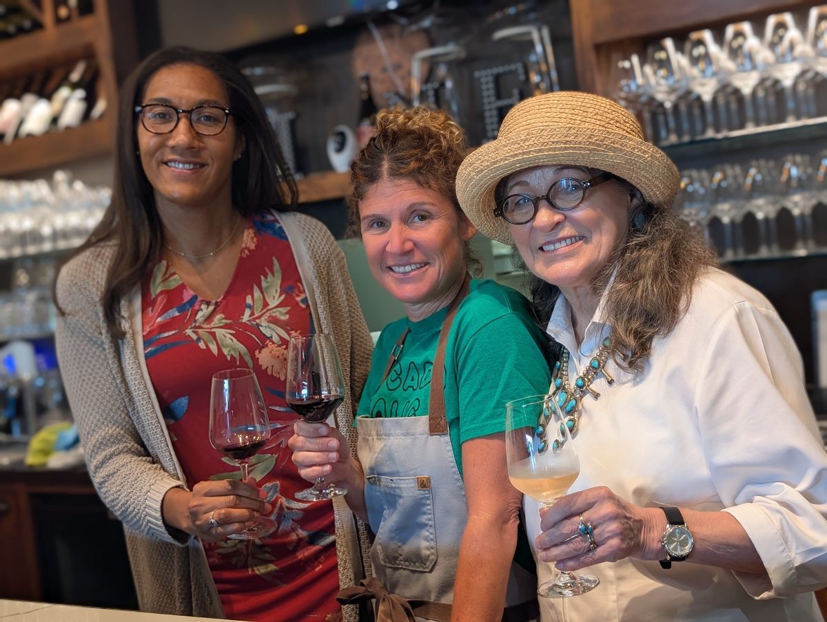 Brittany Alexander, Sharon Smith and Mary Watson at the bar